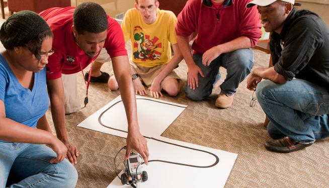 ACM students working with Lego Mindstorms Robots